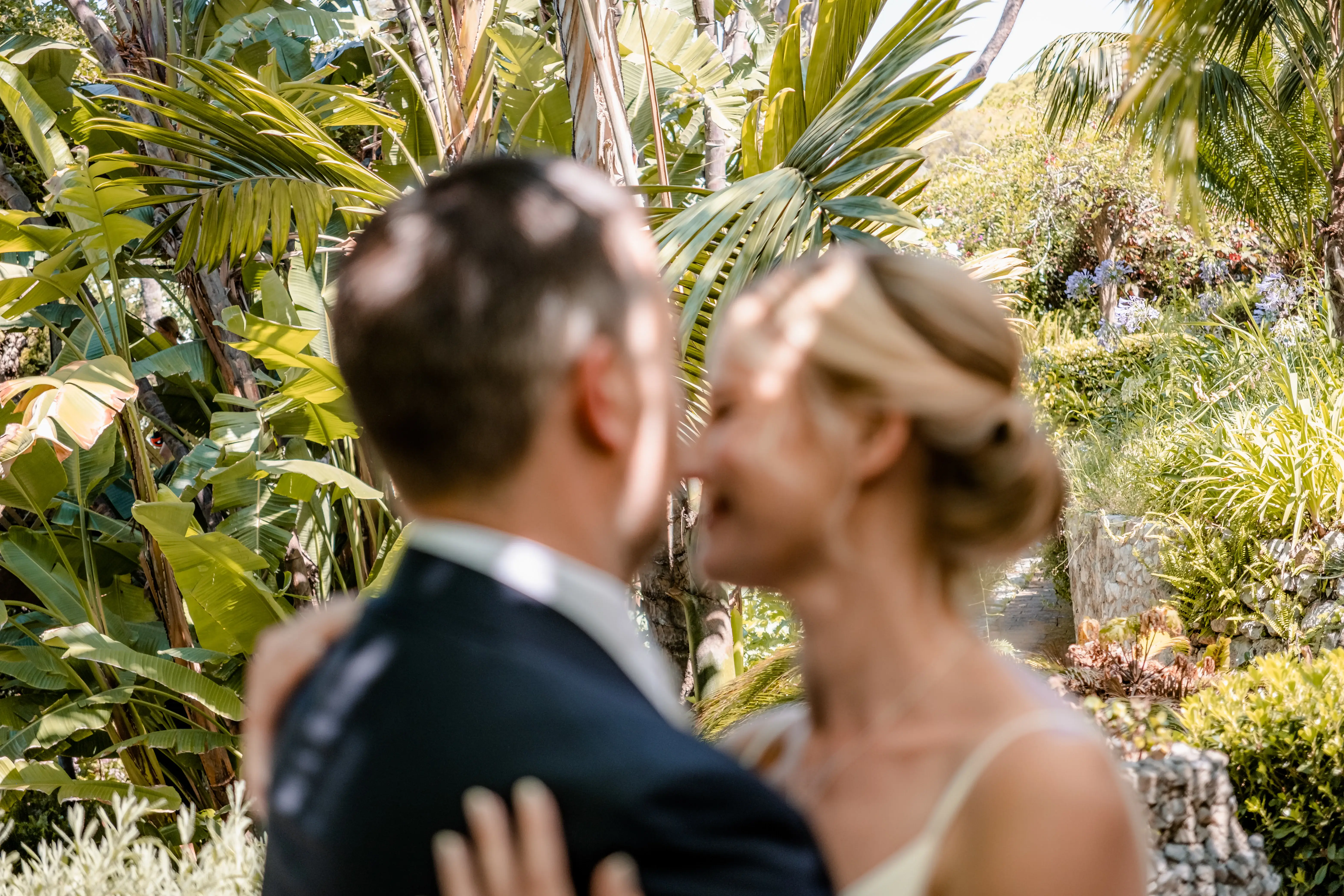 Bride and groom walking together outdoors